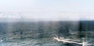 Asisbiz Japanese small freighter under air attack from USS Bunker Hill (CV 17) VT 17 planes off Tinian 17 18th Feb 1944 80 G 218555