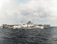 Asisbiz USS Bountiful (AH 9) taking casualties on board from USS Bunker Hill (CV 17) 12th May 1945 80 G 350765