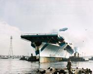 Asisbiz USS Bunker Hill (CV 17) after launching at the Bethlehem Steel Company's Fore River yards Massachusetts 7th Dec 1942 NH 97290
