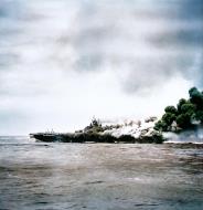 Asisbiz USS Bunker Hill (CV 17) burning after being hit by a Kamikaze off Okinawa 11th May 1945 80 G 274261