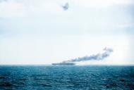Asisbiz A carrier burning after a Japanese Kamikaze attack seen fron USS CABOT (CVL 28) 25th Nov 1944 80 G 270915
