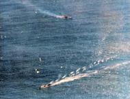 Asisbiz German submarine under attack by USS Card (CVE 11) Task Force north of the Azores 4th Oct 1943 80 G 208921