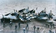 Asisbiz Grumman F6F 5 Hellcat smashes into 6 other Hellcats parked forward on Cowpens' flight deck Jan 1945 02