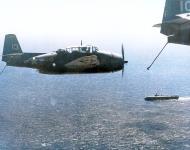 Asisbiz Grumman TBM Avengers from VT 25 White C13 preparing to land aboard USS Cowpens (CVL 25) 01