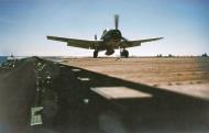 Asisbiz USS Cowpens (CVL 25) Grumman F6F 3 Hellcat VF 25 landing aboard late 1943 80 G K 1072