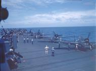 Asisbiz USS Cowpens (CVL 25) Grumman F6F 3 Hellcats VF 25 warm up on the flight deck during raids on the Marshall Islands Jan 1944 80 GK 100