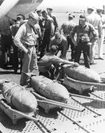 Asisbiz USS Cowpens (CVL 25) bombs that have been inscribed with messages Wake Island Raid 5 6th Oct 1943 80 G 208176