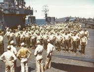 Asisbiz USS Cowpens (CVL 25) ship's Marines line up on the flight deck for physical drill mid 1943 80 G K 13723