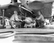 Asisbiz Douglas SBD 3 Dauntless VS 6 ordnance men load a 500lb bomb USS Enterprise (CV 6) Guadalcanal 7th Aug 1942 80 G 10458