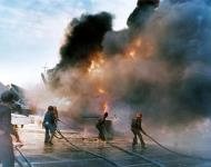 Asisbiz Fire fighting aboard USS Enterprise (CV 6) after a Kamikaze hit off Japan 20th Mar 1945 80 G 274216