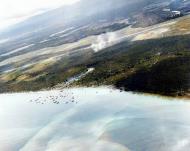 Asisbiz Landing craft clustered offshore during landing operations at Lunga point Guadalcanal Nov 1942 80 G 30521