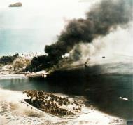 Asisbiz Tanambogo Island under bombardment by USN ships and carrier aircraft Guadalcanal Tulagi Operation on 7th Aug 1942 NH 97746
