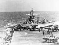Asisbiz USS Dunlap (DD 384) cuts across the stern of USS Enterprise (CV 6) off Hawaii 8th April 1942 80 G 16958