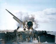 Asisbiz USS Enterprise (CV 6) F6F 3 Hellcat VF 2 pilot BM Johnson escaped injury after landing mishap 10th Nov 1943 80 G 205473
