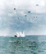 Asisbiz USS Enterprise (CV 6) Kamikaze aircraft hits the water off Okinawa 11th April 1945 80 G 317421