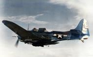 Asisbiz USS Enterprise (CV 6) SBD Dauntless secures equipment as the pilot tries to release bombs before ditching 30th Mar 1944 80 G 250381