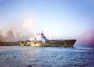 Asisbiz USS Enterprise (CV 6) arriving in New York for Navy Day is warped into her Hudson River slip by tugs 17th Oct 1945 80 GK 6557