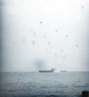 Asisbiz USS Enterprise (CV 6) hit by kamikaze on 21 May 1945 80 G 323565