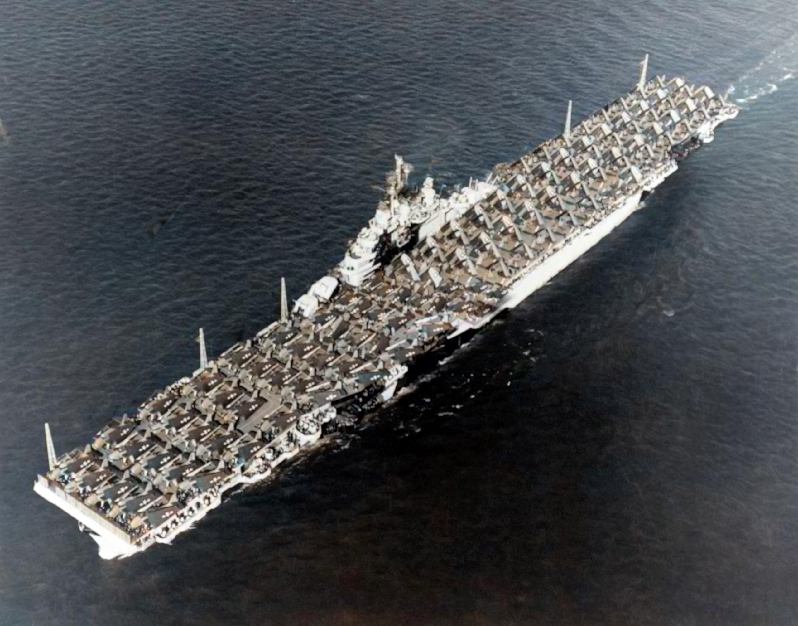 Asisbiz USS Essex (CV-9) at sea with an overload of aircraft on her flight deck 14th May 1944