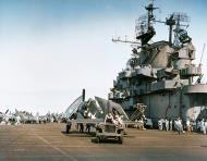 Asisbiz Grumman F6F 3 Hellcat of VF 9 towed aft by a Jeep aboard USS Essex (CV 9) Feb 1944 80 G 217565
