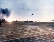 Asisbiz Japanese bomber explodes on the water just astern of USS Essex (CV 9) after being shot down 11th Nov 1943 80 G 206615