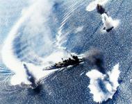 Asisbiz Japanese cruiser Nachi under air attack from task group 38.3 in Manila Bay 5th Nov 1944 80 G 287018