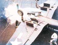Asisbiz USS Essex (CV 9) fire erupts from an F4U Corsair after it crashed into the barrier 8th April 1945 80 G 373761