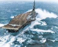 Asisbiz USS Essex (CV 9) in heavy seas during her deployment 12th Jan 1960 NH 98517
