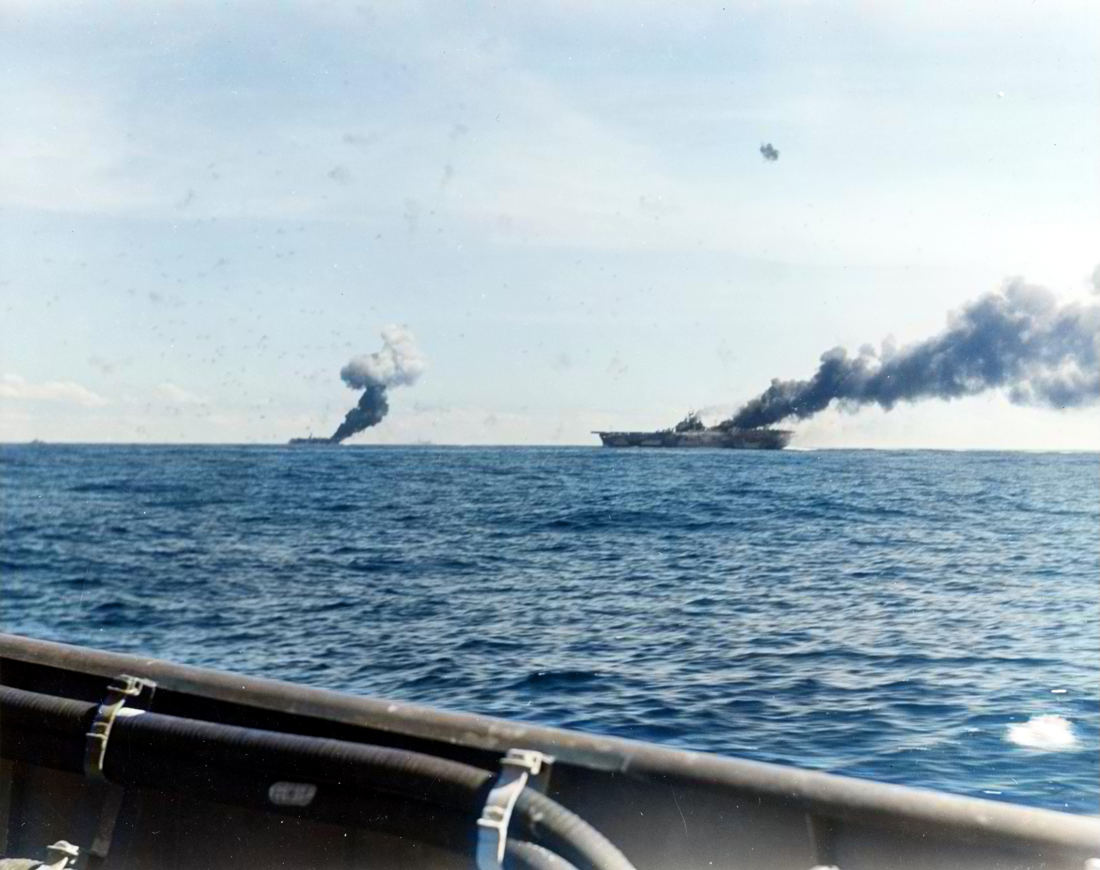 USS Franklin (CV 13) and USS Belleau Wood (CVL 24) both hit by a Japanese Kamikazes operating off Philippines 30th Oct 1945 80 G 326798