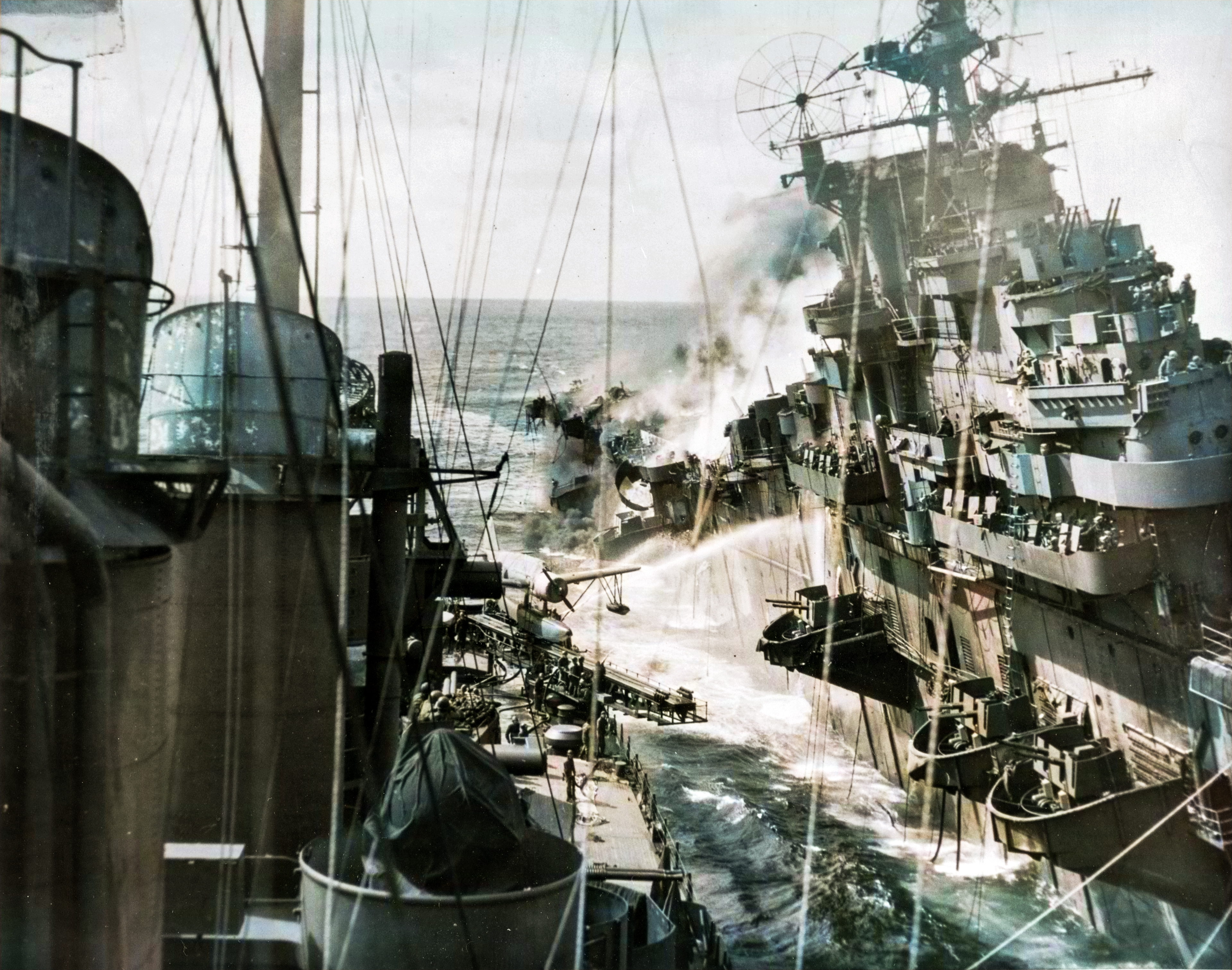 USS Franklin (CV 13) hit by a Japanese air attack while operating off the coast of Japan 19th Mar 1945 80 G 273888