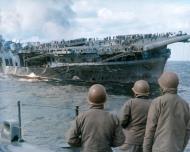 Asisbiz USS Franklin (CV 13) after being hit by bombs from Jap dive bombers view from USS Sante Fe (CL 60) 19th Mar 1945