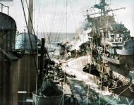 Asisbiz USS Franklin (CV 13) hit by a Japanese air attack while operating off the coast of Japan 19th Mar 1945 80 G 273888