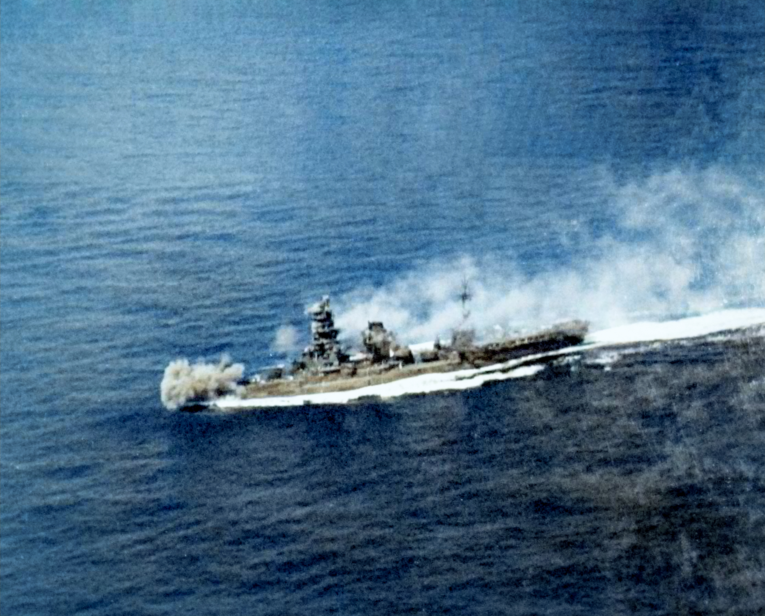 Japanese battleship Ise receiving a direct hit during the Battle off Cape Engano 25th Oct 1944 80 G 373669