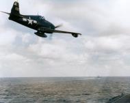 Asisbiz Grumman F6F 5N Hellcat night fighter drops a message onto the USS Hornet II (CV 12) during strikes on Formosa 12th Oct 1944 80 G 284466