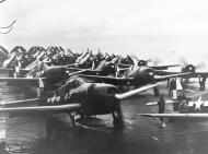 Asisbiz USS Hornet II (CV 12) Grumman F6F 5 Hellcats VF 17 warm up prior to take off for raids on Tokyo Japan 16 17 Feb 1945 80 G 469292