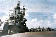 Asisbiz USS Hornet II (CV 12) with Grumman F6F 5 Hellcats from VF 17 Jolly Rogers on deck in April 1945 80 G 469299