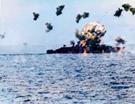 Asisbiz USS Louisville (CA 28) is hit by a Japanese kamikaze off Lingayen Gulf Philippines 5th Jan 1945 80 G 342378