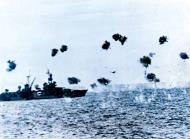 Asisbiz USS Louisville (CA 28) is hit by a Japanese kamikaze off Lingayen Gulf Philippines 5th Jan 1945 80 G 342379