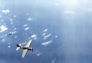Asisbiz USS Intrepid (CV-11) SB2C Helldivers enroute to attack the Japanese fleet during the Battle of Sibuyan Sea Oct 1944 03