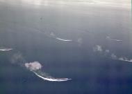 Asisbiz USS Intrepid (CV-11) SB2C Helldivers enroute to attack the Japanese fleet during the Battle of Sibuyan Sea Oct 1944 09