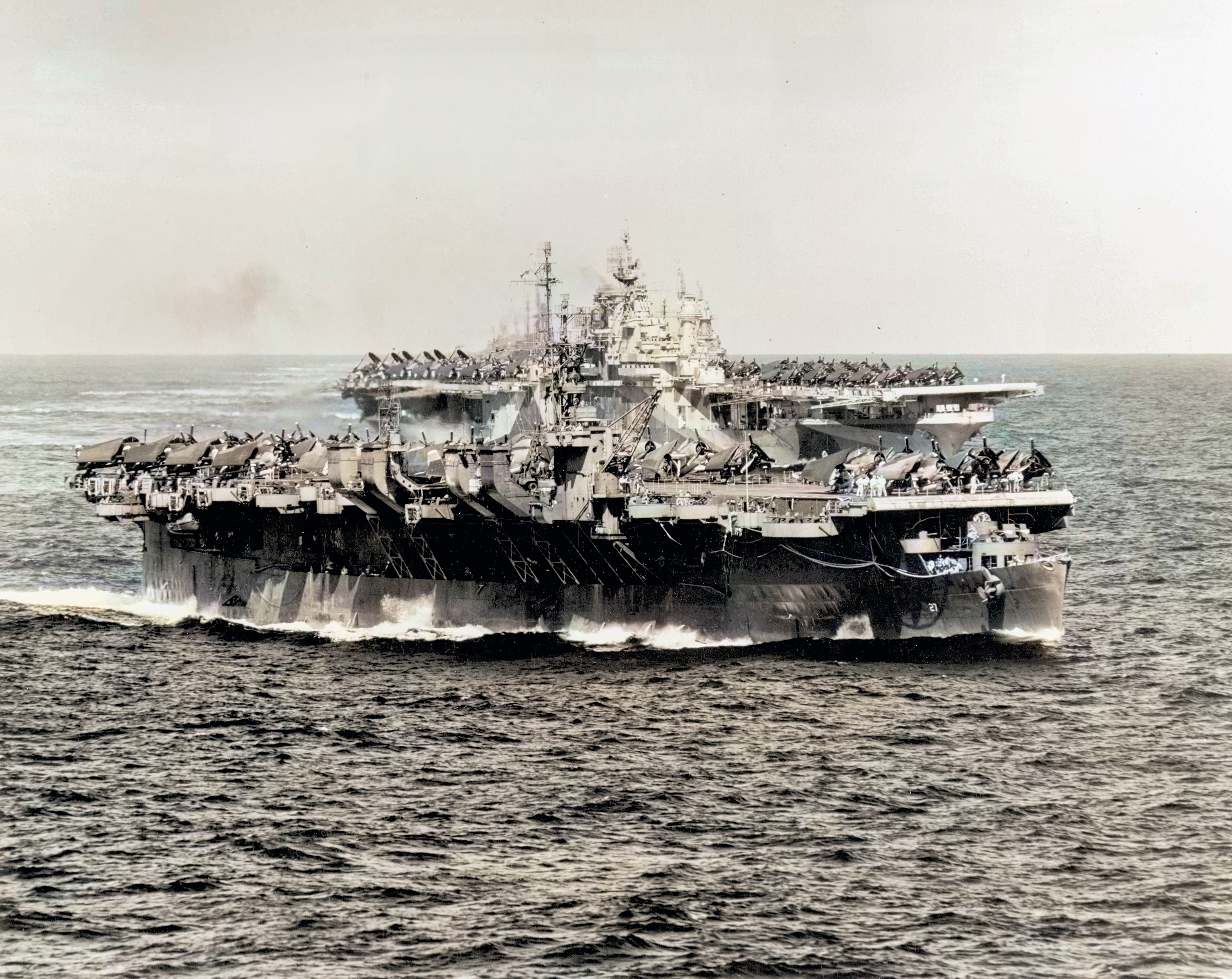 Asisbiz USS Langley (CVL 27) Task Group 38.3 makes a simultaneous turn to port entering Ulithi anchorage 12th Dec 1944 80 G 301354