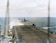 Asisbiz F6F Hellcat landing aboard USS Langley (CVL 27) off Nansei Shoto 10th October 1944 80 G 284074
