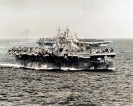Asisbiz USS Langley (CVL 27) Task Group 38.3 makes a simultaneous turn to port entering Ulithi anchorage 12th Dec 1944 80 G 301354