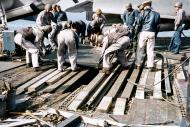 Asisbiz USS Langley (CVL 27) flight deck under repair after being hit by a Kamikaze off Formosa 21st Jan 1945 80 G 273441