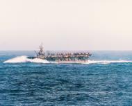Asisbiz USS Langley (CVL 27) in heavy seas during operations against the Japanese TF38.3 Philippines Dec 1944 80 G 301359