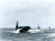 Asisbiz USS Langley (CVL 27) pitching enroute to press attacks on Japanese homeland with CLs beyond 18th March 1945 80 G 313864