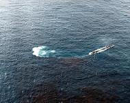 Asisbiz A rescue submarine gets underway after picking up a downed aviator off Saipan 19th June 1944 80 G 236956