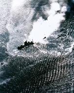 Asisbiz Japanese Nachi sinking in Manila Bay after being bombed and torpedoed by USN carrier planes 5th Nov 1944 80 G 288872