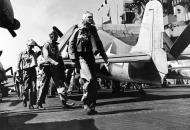 Asisbiz USS Lexington II (CV 16) Grumman F6F 3 Hellcat VF 16 BulNo 66197 prior to takeoff Nov 1943 80 G 473081
