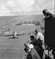 Asisbiz USS Lexington II (CV 16) Grumman F6F 3 Hellcat taxies into position after landing 26th Nov 1943 80 G 471196